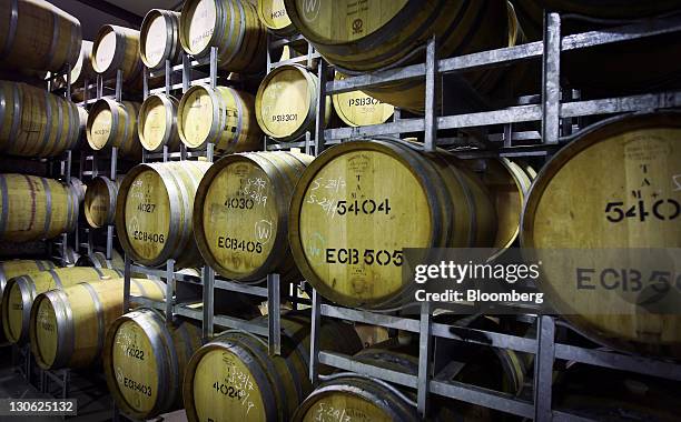 Oak barrels are stored at the Capercaillie Wine Co. Cellar in Lovedale, in the Hunter Valley region of Australia, on Tuesday, Oct. 18, 2011....