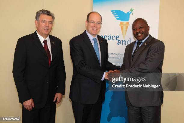 Joel Bouzou, HRH Prince Albert II of Monaco and president of the Republic of Burundi Pierre Nkurunziza attend Plenary Sessions at the Peace & Sport...