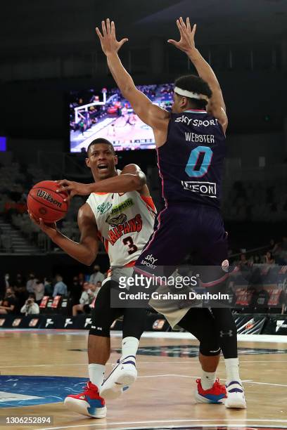 Scott Machado of the Taipans looks to pass during the NBL Cup match between the New Zealand Breakers and the Cairns Taipans at John Cain Arena on...