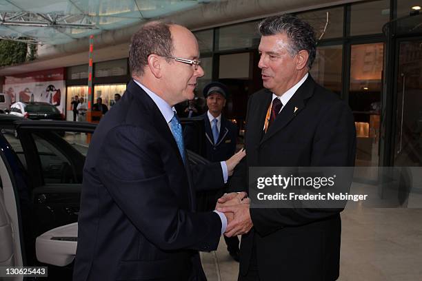 Prince Albert II of Monaco is welcomed by Joel Bouzou ahead of Plenary Sessions at the Peace & Sport 5th International Forum at Hotel Fairmont on...