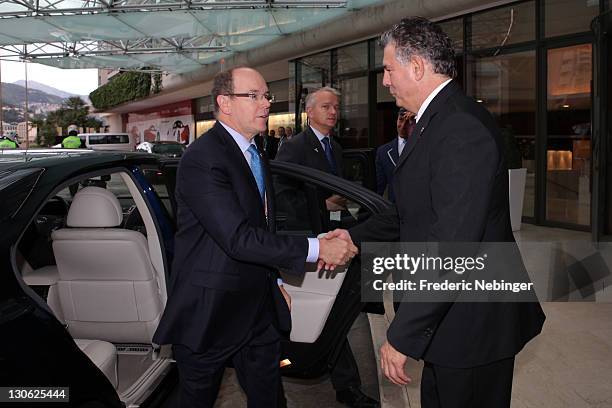 Prince Albert II of Monaco is welcomed by Joel Bouzou ahead of Plenary Sessions at the Peace & Sport 5th International Forum at Hotel Fairmont on...