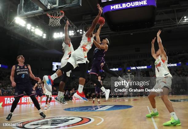 Tai Webster of the Breakers shoots under pressure during the NBL Cup match between the New Zealand Breakers and the Cairns Taipans at John Cain Arena...