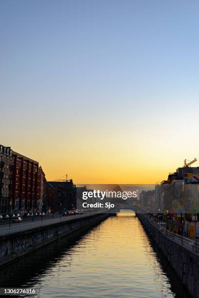 brussels canal in belgium after sunset - brussels canal stock pictures, royalty-free photos & images