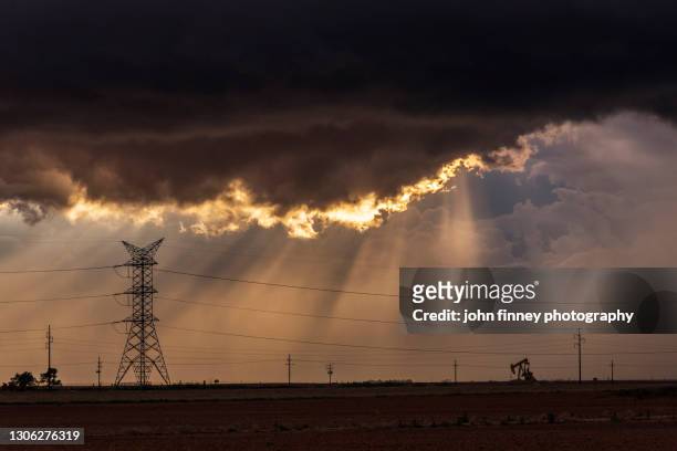 industrial scene under a thunderstorm, channing. - the beauty of power event stock pictures, royalty-free photos & images