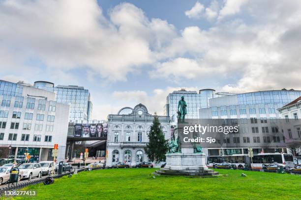 luxembourg square in the city of brussels with the eu parliament in the background - brussels square stock pictures, royalty-free photos & images