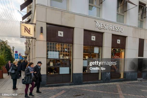 nespresso coffee store in brussels, belgium - nestlé stock pictures, royalty-free photos & images