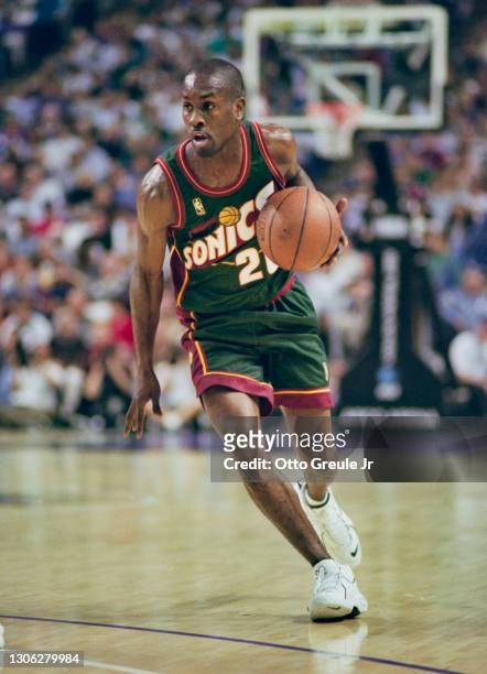 Gary Payton, Point Guard for the Seattle SuperSonics dribbles the basketball down court during the NBA Pacific Division basketball game against the...