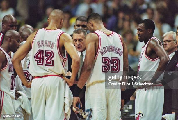 Pat Riley, Head Coach for the Miami Heat instructs his players in the huddle during Game 2 Round 1 of the NBA Eastern Conference Playoff basketball...