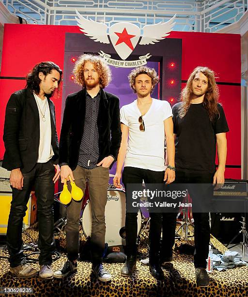 Joseph Grazi, Nathaniel Hoho, Jessie Kotansky and Grant Wilson performs during Andy Hilfiger introduction of rock inspired clothing line called...