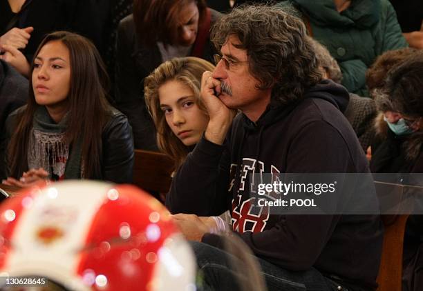 (From L° Marco Simoncelli's girlfriend Kate Fretti, his sister Martina and father Paolo attend the funeral service of Italian MotoGP rider Marco...