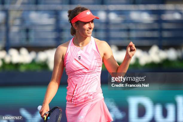 Elise Mertens of Belgium celebrates winning her round of 16 match against Caroline Garcia of France during Day Four of the Dubai Duty Free Tennis at...