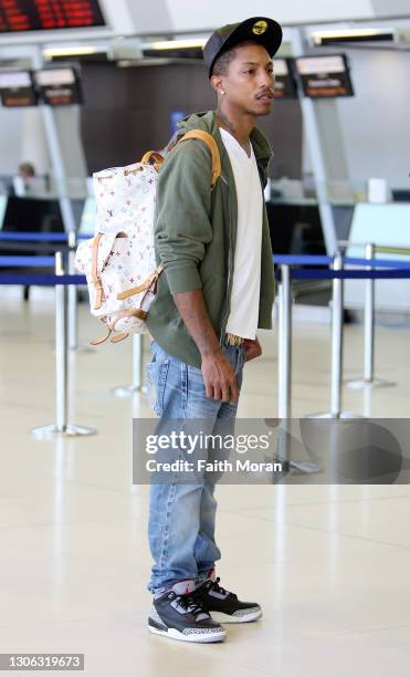 Pharrell Williams is seen departing Perth International Airport on January 9 2011, in Perth, Australia.