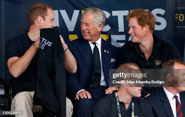 Prince William, Duke of Cambridge, Prince Charles, Prince of Wales & Prince Harry watch the athletics during the Invictus Games at the Lee Valley...