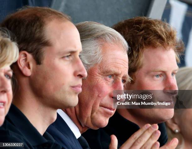 Prince William, Duke of Cambridge, Prince Charles, Prince of Wales & Prince Harry watch the athletics during the Invictus Games at the Lee Valley...