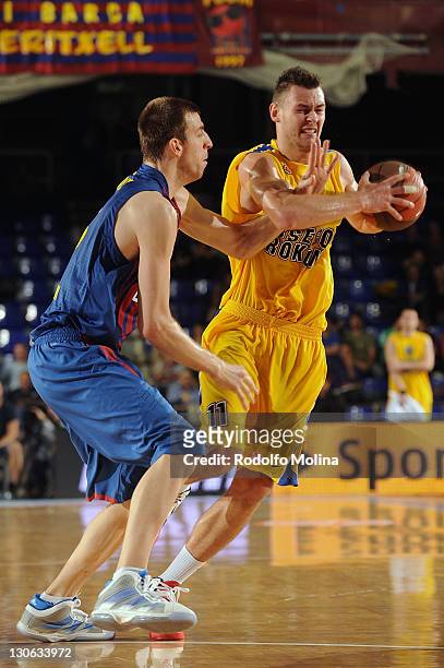 Donatas Motiejunas, #11 of Asseco Prokom Gdynia in action during the 2011-2012 Turkish Airlines Euroleague Regular Season Game Day 2 between FC...