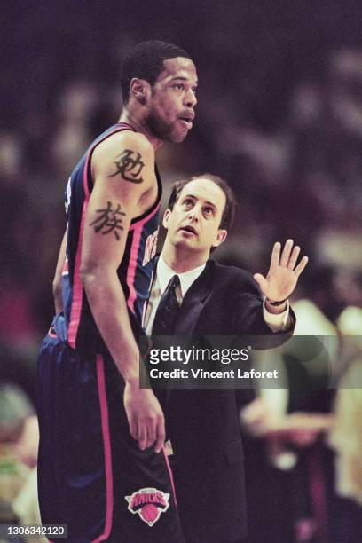 Jeff Van Gundy, Head Coach for the New York Knicks gives play instructions to his Power Forward and Center Marcus Camby during the NBA Central...