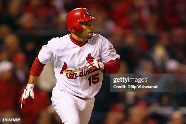 Rafael Furcal of the St. Louis Cardinals runs towards first base against the Texas Rangers during Game One of the MLB World Series at Busch Stadium...