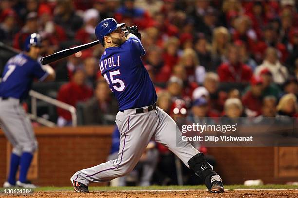 Mike Napoli of the Texas Rangers bats against the St. Louis Cardinals during Game One of the MLB World Series at Busch Stadium on October 19, 2011 in...