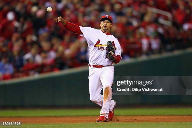 Rafael Furcal of the St. Louis Cardinals throws the ball to first base against the Texas Rangers during Game One of the MLB World Series at Busch...