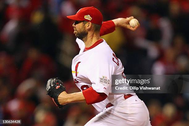 Chris Carpenter of the St. Louis Cardinals throws a pitch against the Texas Rangers during Game One of the MLB World Series at Busch Stadium on...