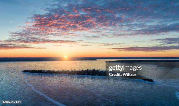 treasure island ariel winter magenta sunrise - michigan landscape stock pictures, royalty-free photos & images