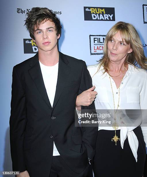 Willoughby Robinson and Sophie Robinson arrive at the Los Angeles Premiere "The Rum Diary" at LACMA on October 13, 2011 in Los Angeles, California.