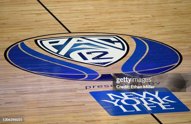 Pac-12 logo is shown on the court during a game between the Washington State Cougars and the Arizona State Sun Devils during the first round of the...