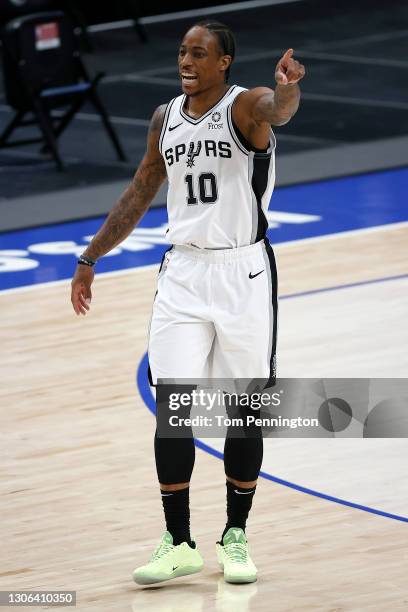 DeMar DeRozan of the San Antonio Spurs reacts against the Dallas Mavericks in the first quarter at American Airlines Center on March 10, 2021 in...