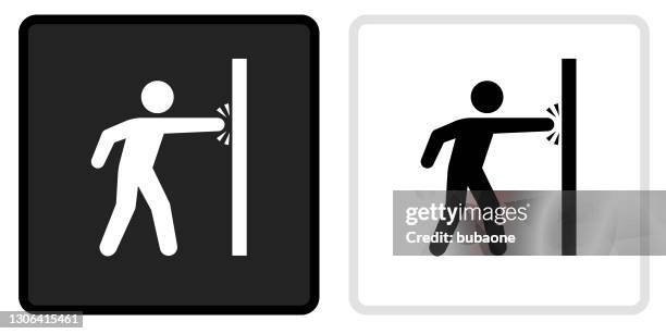 punching wall icon on black button with white rollover - punching through wall stock illustrations