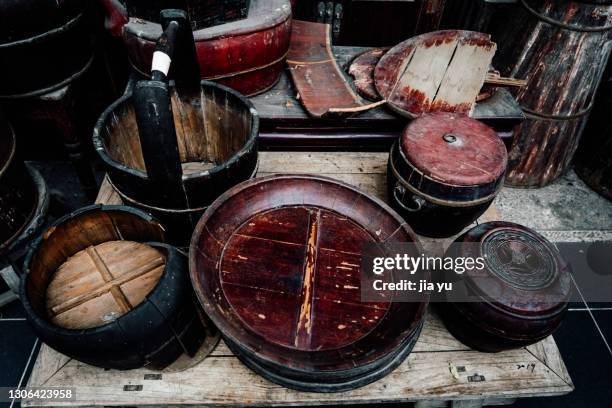 the exhibition hall is for visitors. ancient chinese wooden products. wuxi city, jiangsu province, china. - wash bowl stock-fotos und bilder