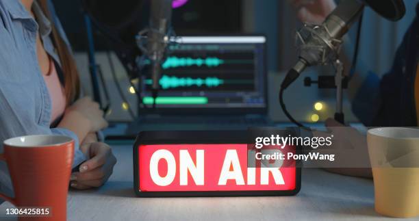 closeup of on air sign - radio host stock pictures, royalty-free photos & images