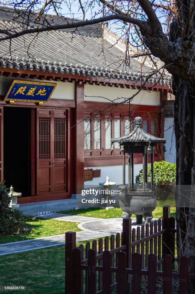 Temple building, plaque on the door frame. Jiangyin City, Jiangsu Province, China.