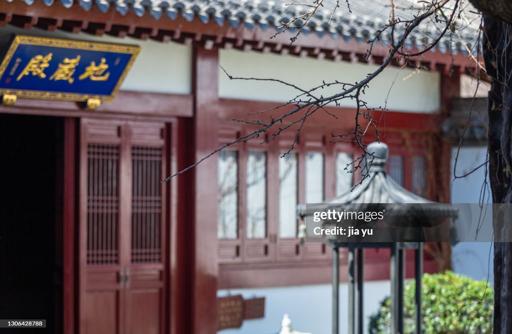 Temple building, plaque on the door frame. Jiangyin City, Jiangsu Province, China.