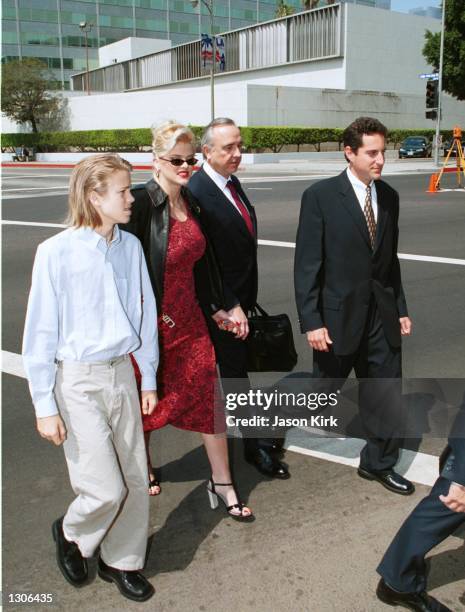 Model Anna Nicole Smith with her son Daniel and her attorneys outside the Los Angeles courthouse July 25, 2000 in Los Angeles, Ca. U.S. District...