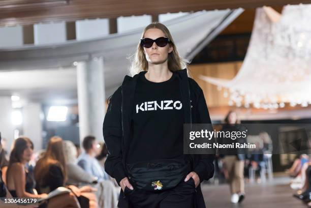 Model walks the runway in designs by Kenzo during Runway 1 at Melbourne Fashion Festival on March 11, 2021 in Melbourne, Australia.