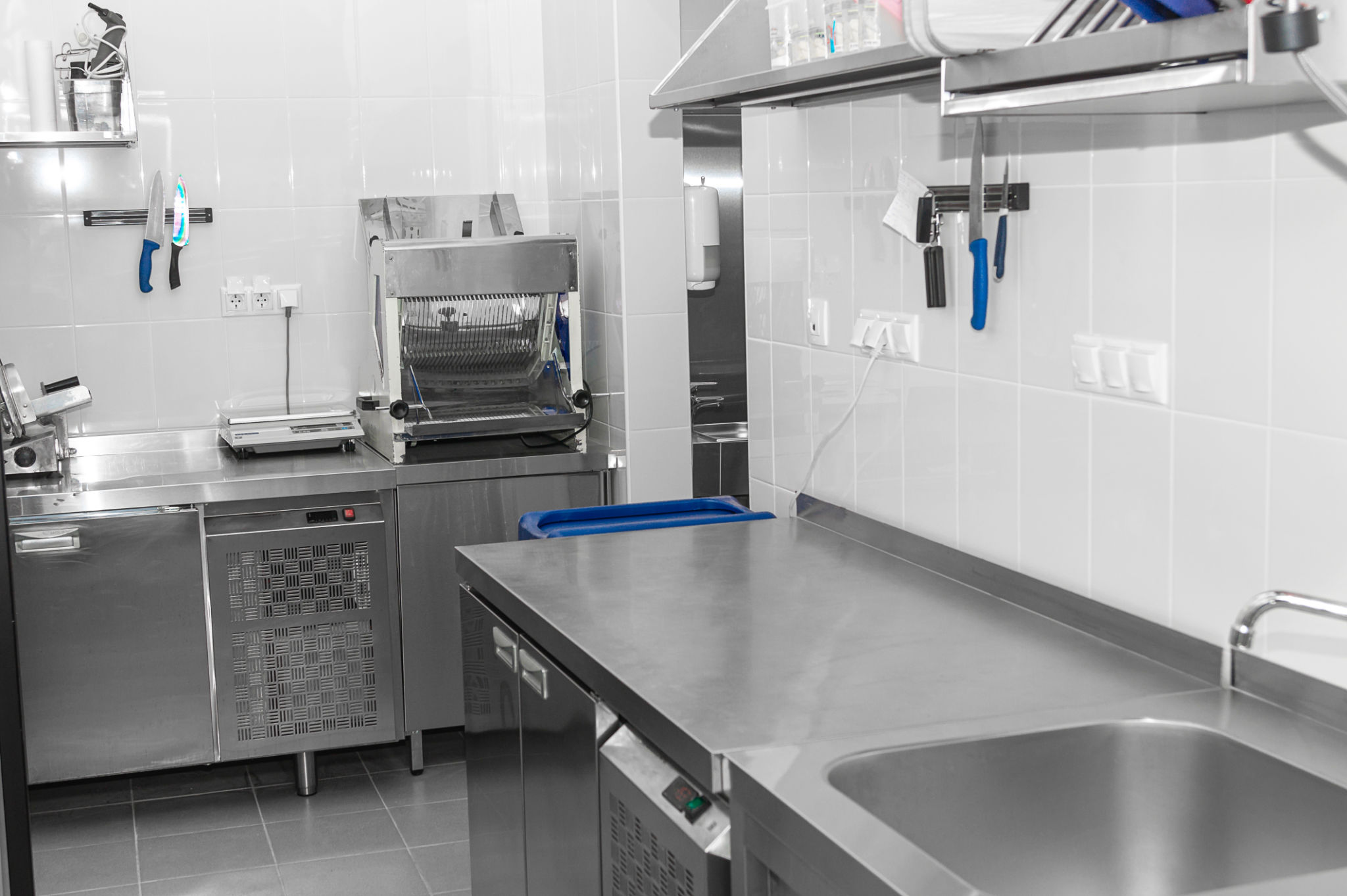 Design of the working area of the commercial cafe kitchen with stainless steel equipments, hot shop, food industry. Design of the working area of the commercial cafe kitchen with stainless steel equipments, hot shop, food industry.