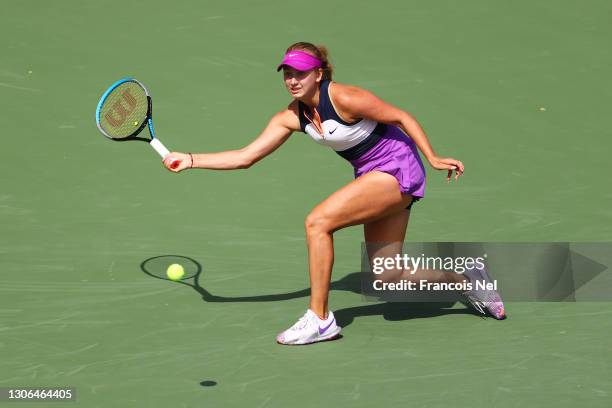 Anastasia Potapova of Russia stretches to play a forehand in her Quarter-Final singles match against Barbora Krejcikova of The Czech Republic during...