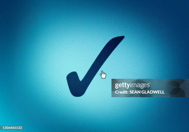 tick symbol on screen - tick symbol stock pictures, royalty-free photos & images