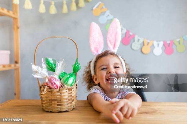 celebrating easter at home - costume rabbit ears stock pictures, royalty-free photos & images