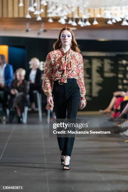 Model showcases designs by Arnsdorf during the Gala Runway at Melbourne Fashion Festival at National Gallery of Victoria on March 11, 2021 in...