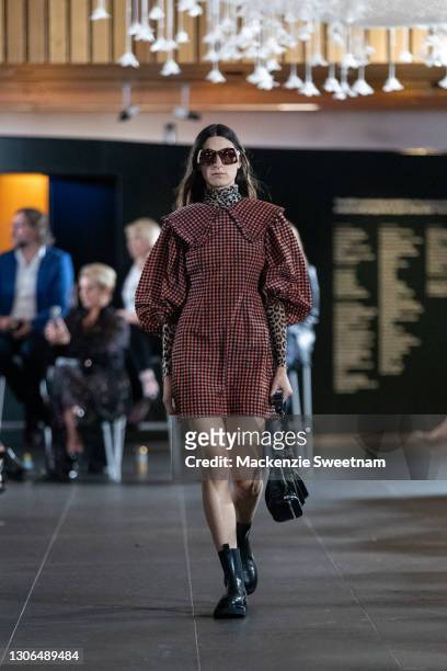 Model showcases designs by Ganni during the Gala Runway at Melbourne Fashion Festival at National Gallery of Victoria on March 11, 2021 in Melbourne,...