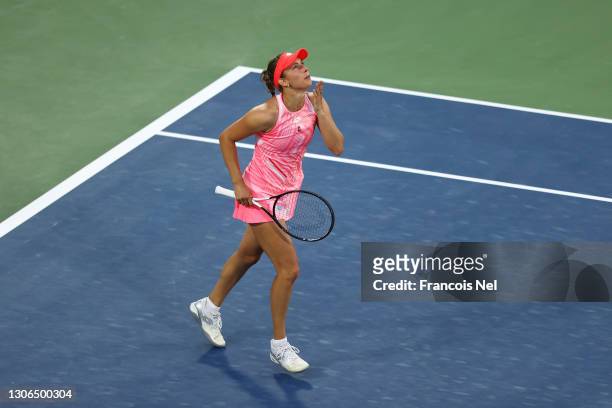 Elise Mertens of Belgium celebrates victory after winning her Quarter-Final singles match against Jessica Pegula of The United States during Day Five...