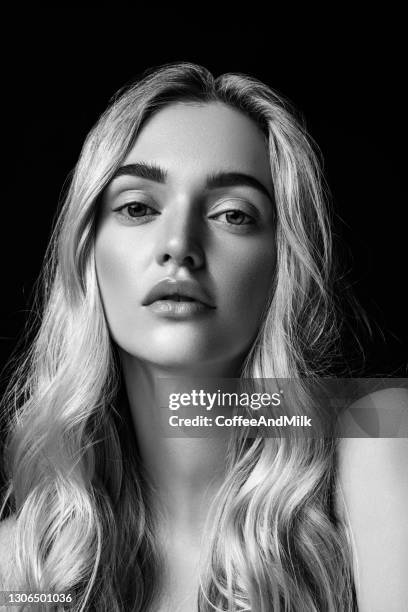 portrait of a beautiful woman with natural make-up - skin care black and white portrait stock pictures, royalty-free photos & images