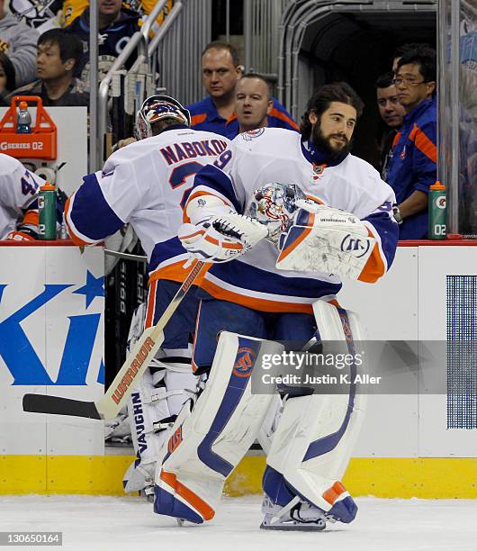 Rick DiPietro of the New York Islanders comes in for the shoot out against the Pittsburgh Penguins during the game at Consol Energy Center on October...