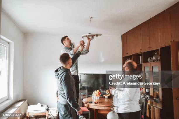 let's fix the ceiling light - table fan stock pictures, royalty-free photos & images