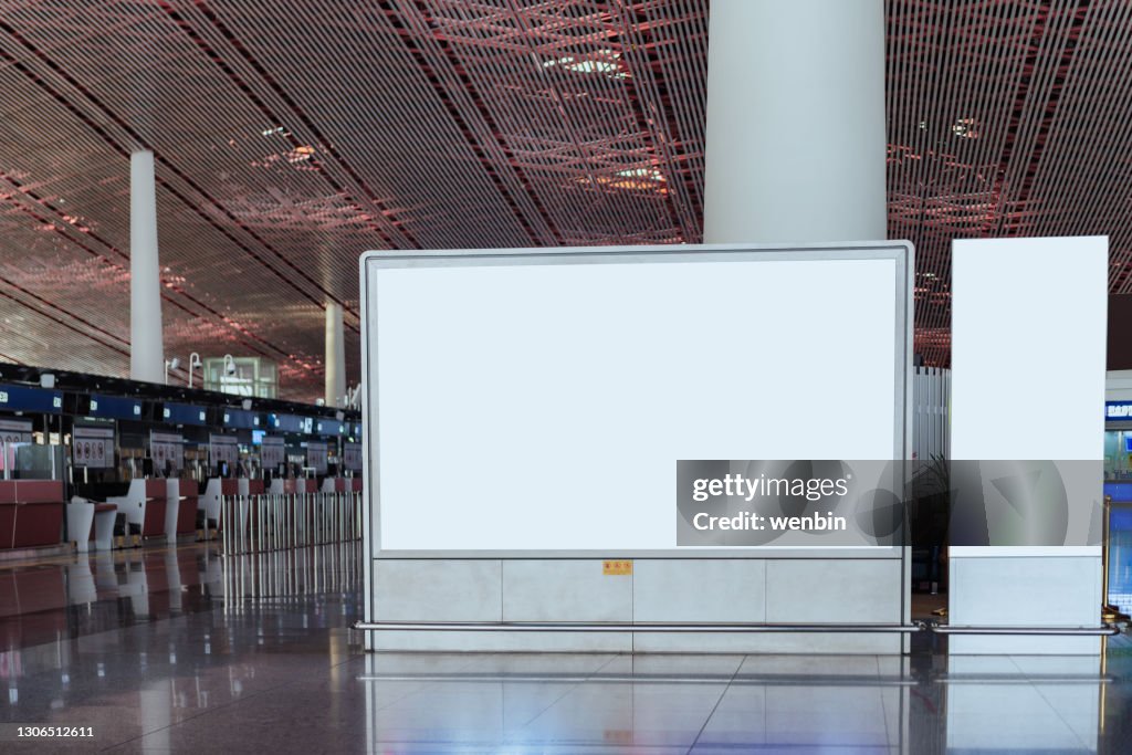 Blank billboard on the corridor of airport