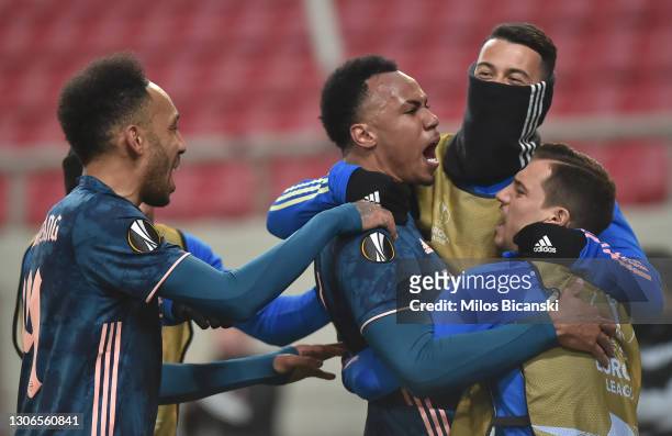 Gabriel of Arsenal celebrates with teammates Pierre-Emerick Aubameyang, Gabriel Martinelli and Cedric Soares after scoring their team's second goal...