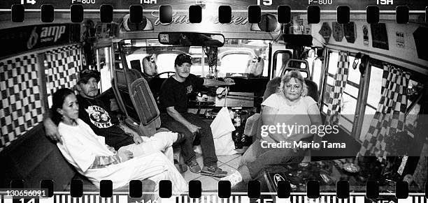 Fans await the start of the NASCAR Sprint Cup Series Good Sam Club 500 in their trailer at Talladega Superspeedway on October 23, 2011 in Talladega,...