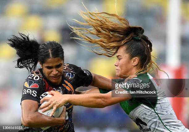 Taleena Simon of the Indigenous All Stars is tackled by Zali Fay of the Maori All Stars during the NRL All Stars game between Indigenous and Maori...