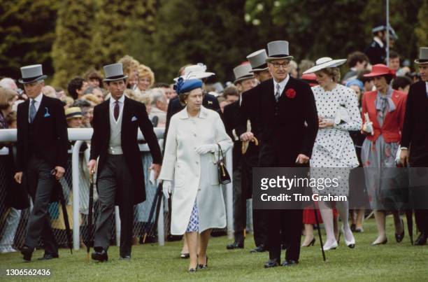 British Royals Charles, Prince of Wales, Queen Elizabeth ll, Prince Philip, Duke of Edinburgh and Diana, Princess of Wales , wearing a dress by...